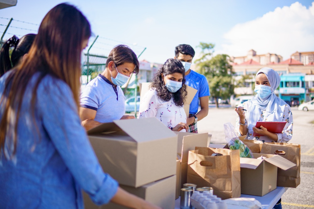 CRN volunteers packing donated food